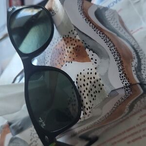 Ray-Ban Black Sunglasses with brown case.